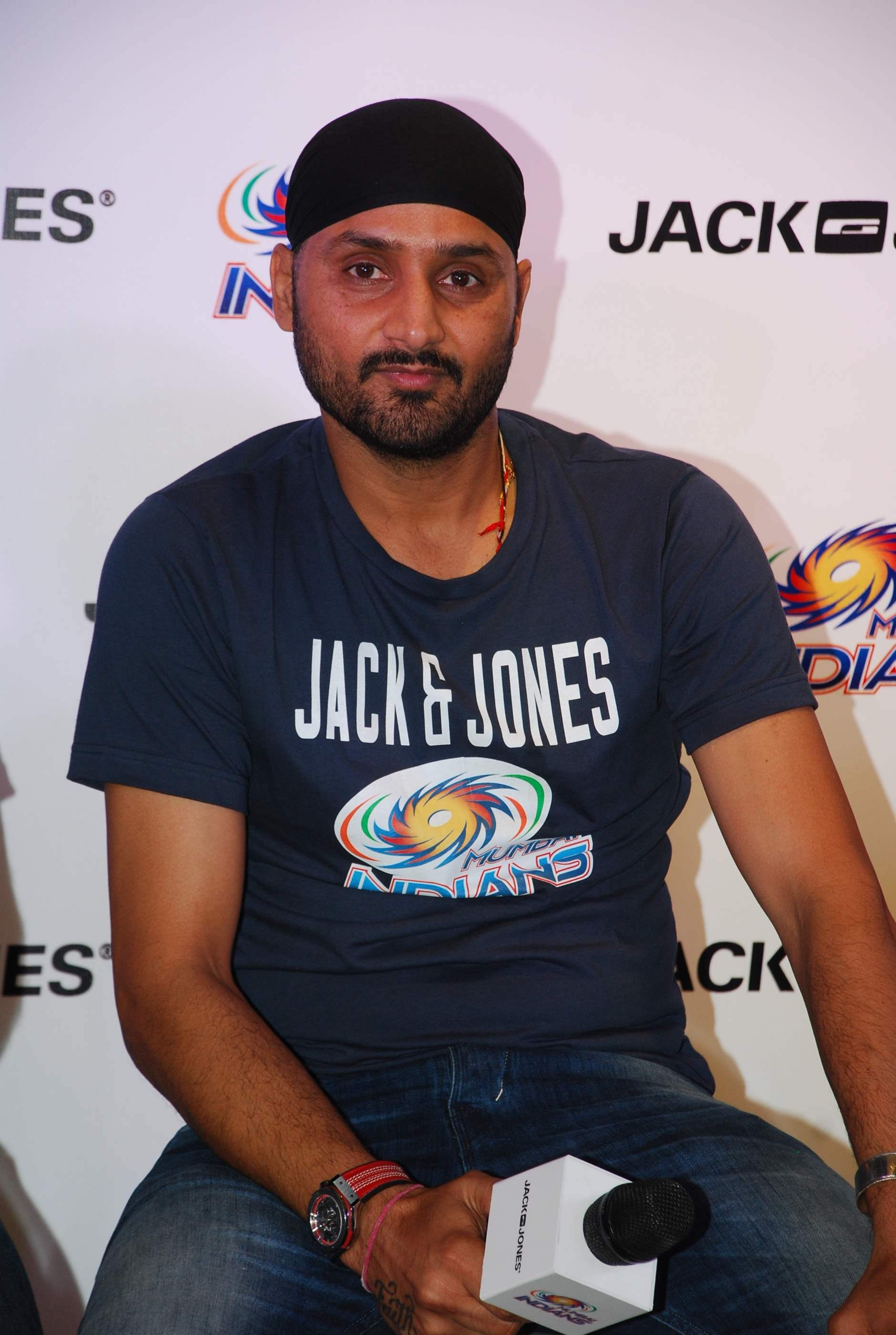 Harbhajan Singh Holding Mike In His Hand