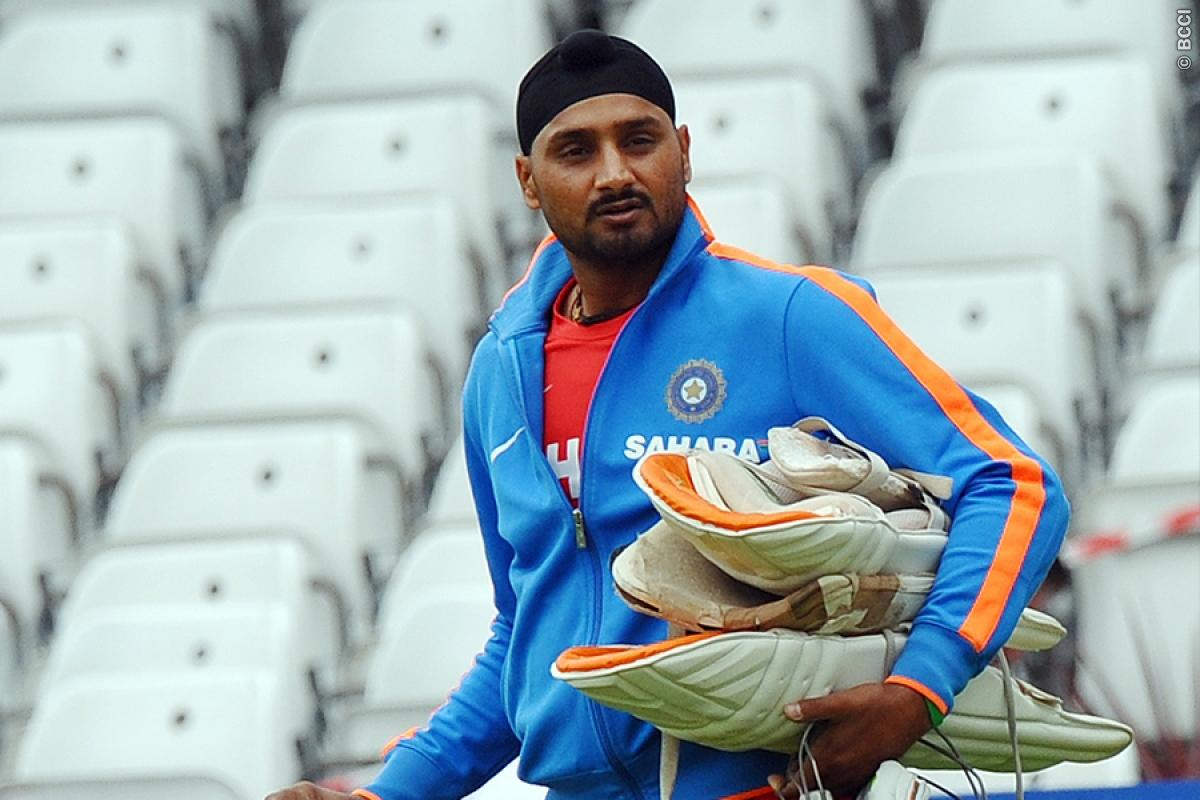 Harbhajan Singh Holding Pads