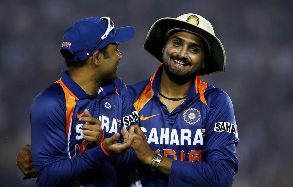 Harbhajan Singh With Another Cricket Player