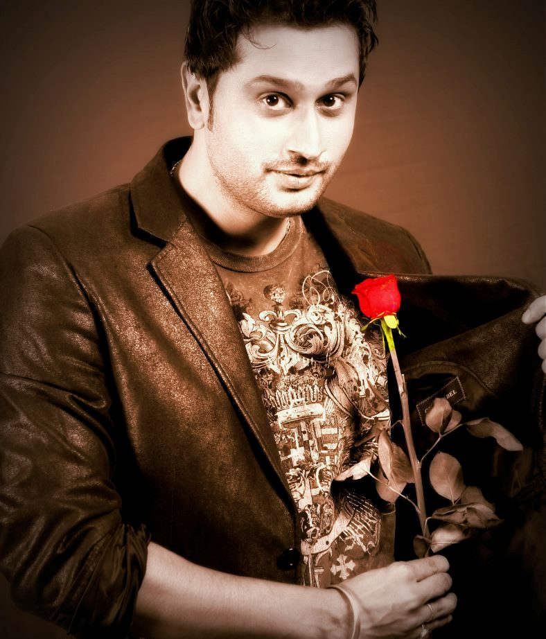 Roshan Prince Holding Red Rose