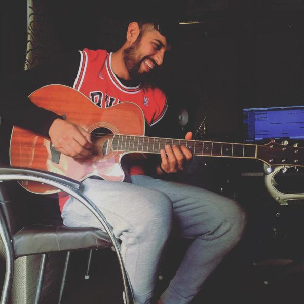 Garry Sandhu Playing Guitar