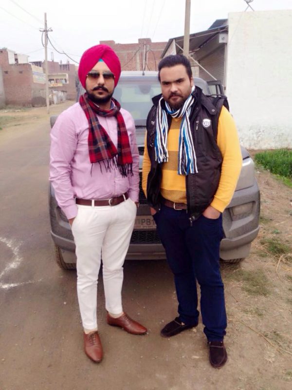 Kulbir Jhinjer Giving Posing With Car