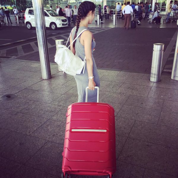 Sheetal Thakur Holding His Suitcase-090387