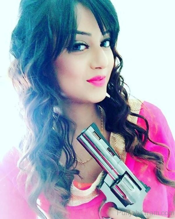 Molina Sodhi With Gun-162