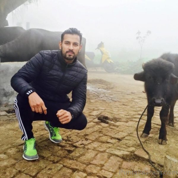 Garry sandhu in black jacket