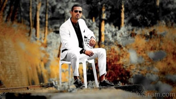 Garry sandhu wearing white coat pant