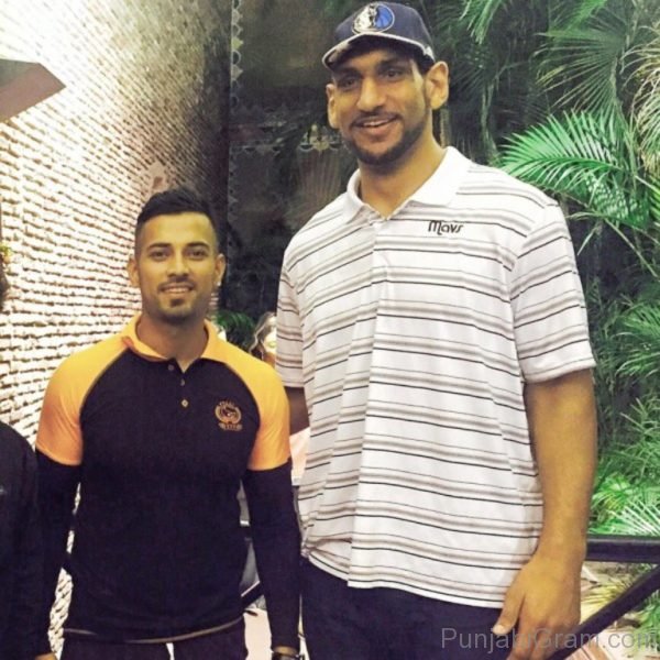 Garry sandhu with basketball player