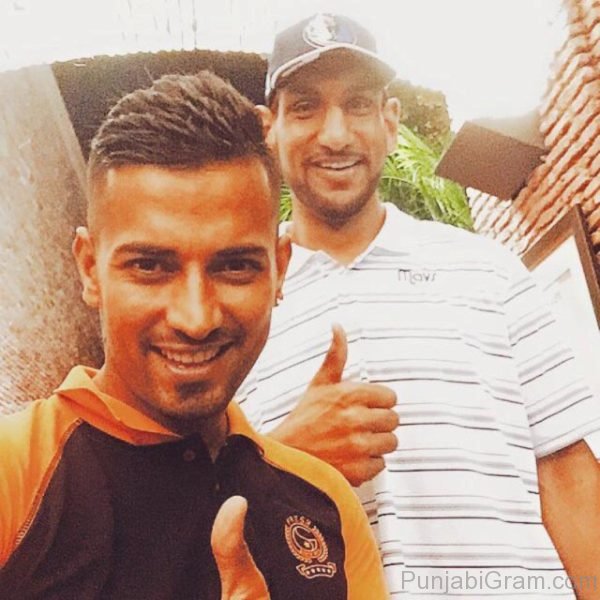 Pic Of Garry sandhu with basketball player