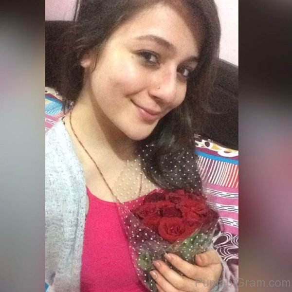 Priyal Gor Holding Red Rose-020