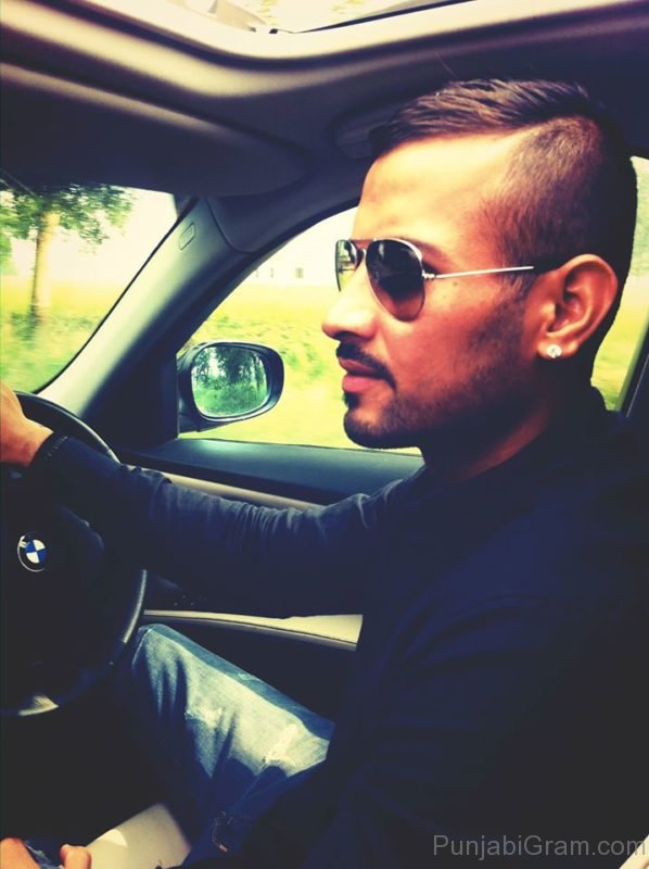 Garry Sandhu Side Pose In Car